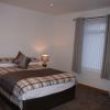 The bedroom is en-suite and has a walk in wardrobe, it is spacious and tastefully furnished.The 
